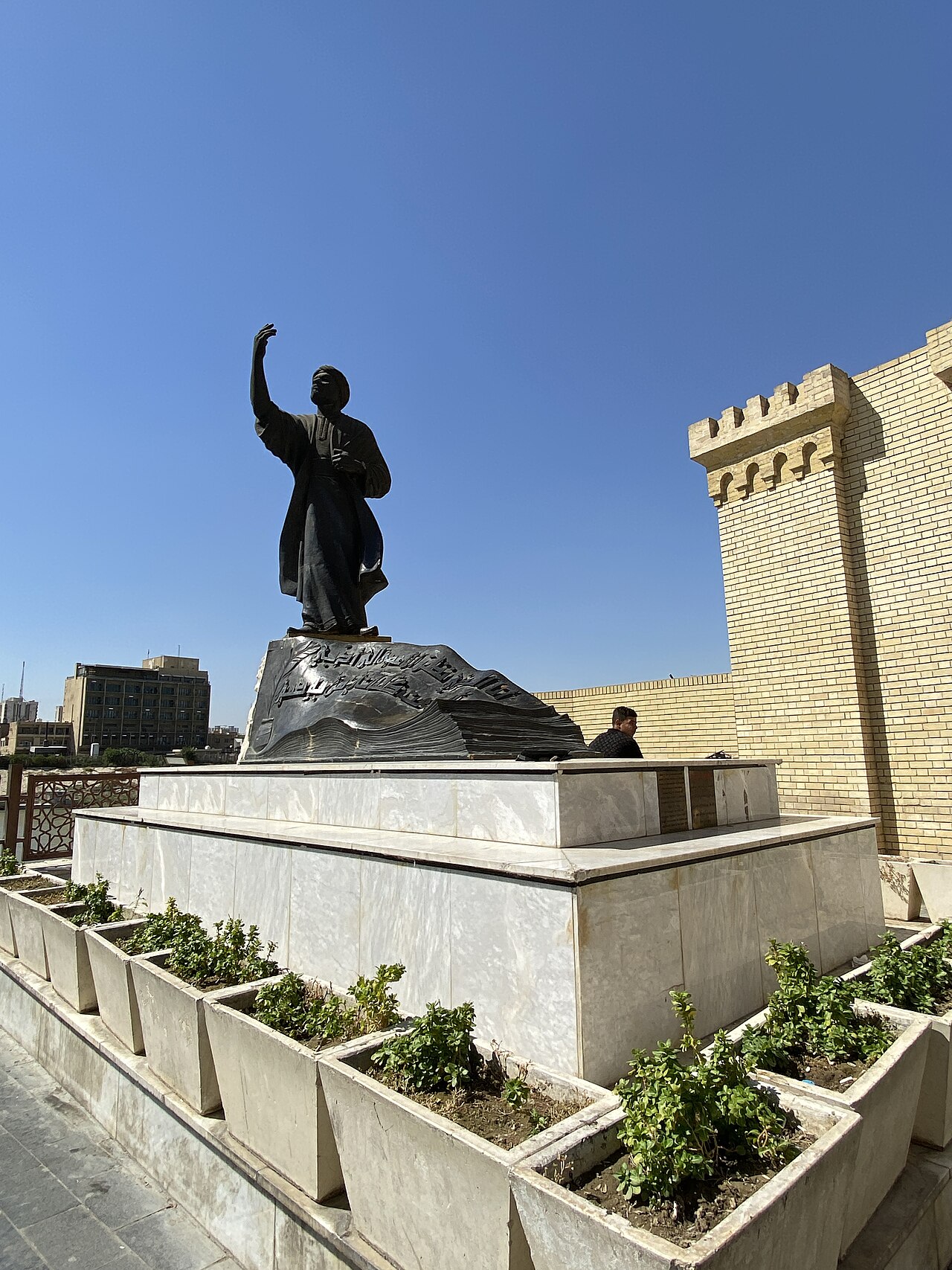 Baghdad: the poet's statue on Al-Mutanabbi Street.
